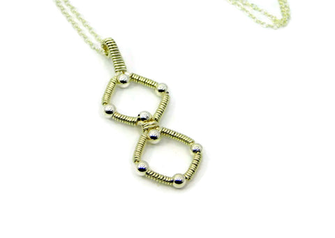 Sterling Silver Double Profile Pendant
